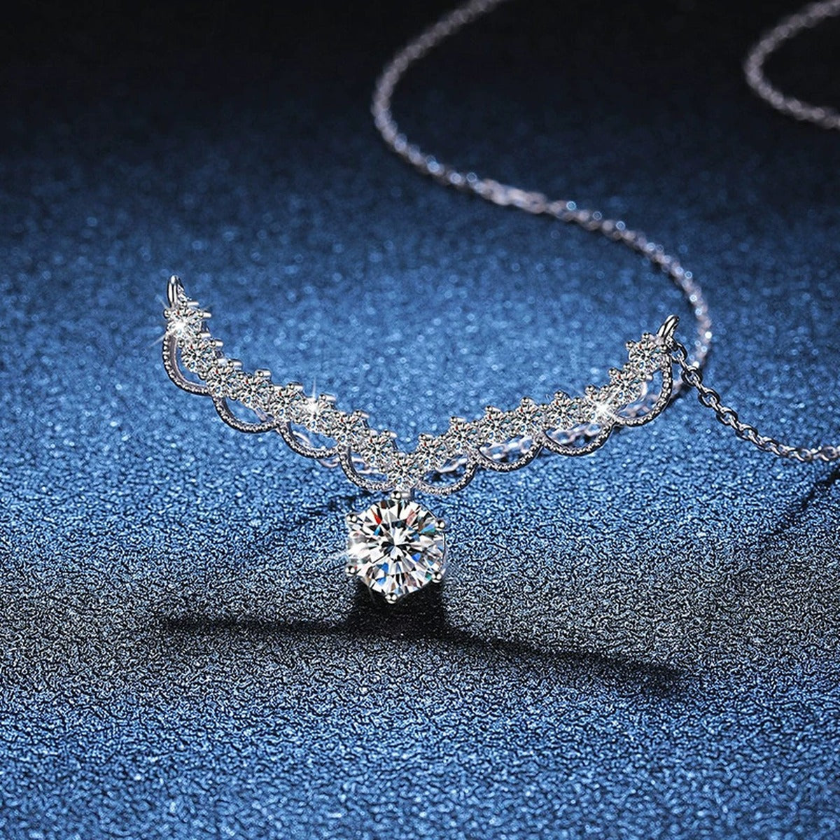 Scalloped Halo Moissanite Collar Necklace in Platinum-Plated S925 Sterling Silver blue background angled view