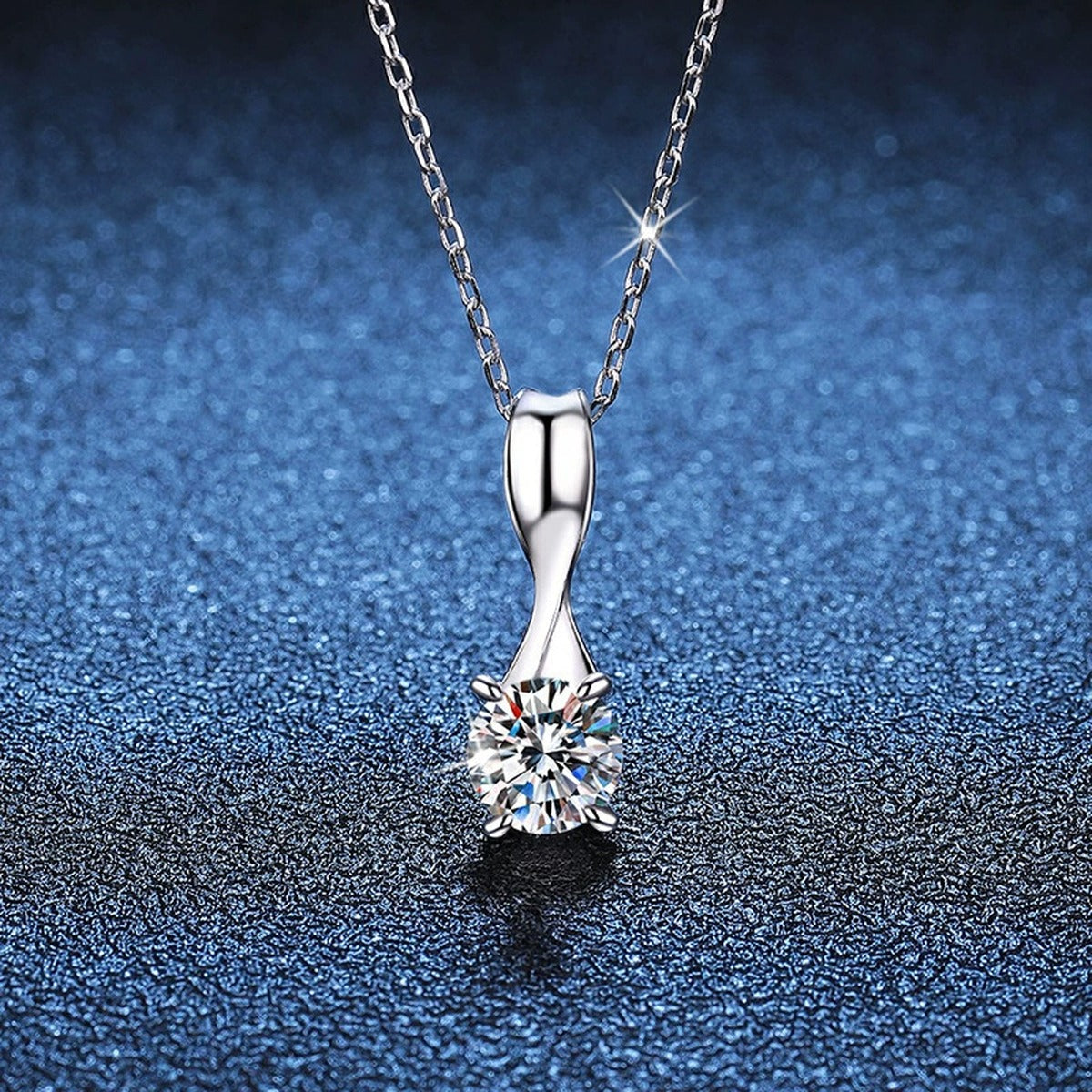 Classic Round Moissanite Solitaire Pendant Necklace in Platinum-Plated S925 Sterling Silver blue background angled view