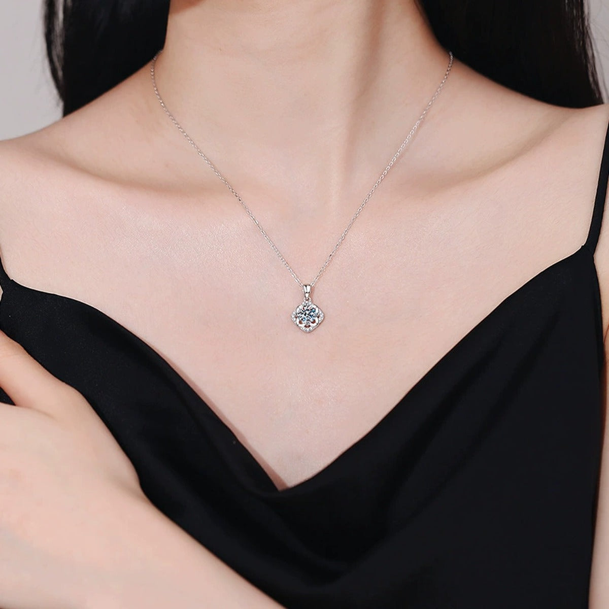 Round Floral Halo Moissanite Pendant Necklace in Platinum-Plated S925 Sterling Silver worn on neckline by model