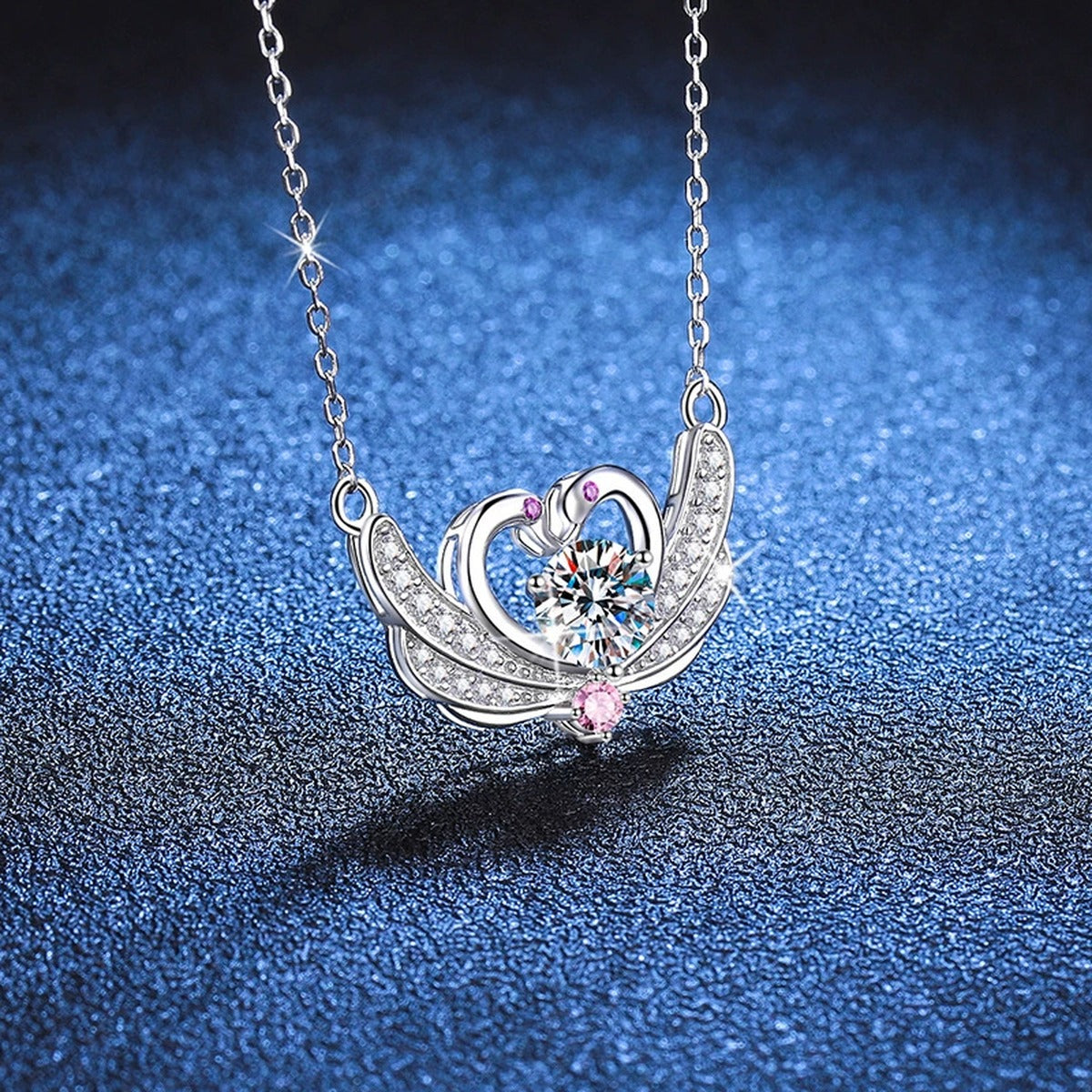 Butterfly Heart Moissanite Pendant Necklace in Platinum-Plated S925 Sterling Silver blue background angled view