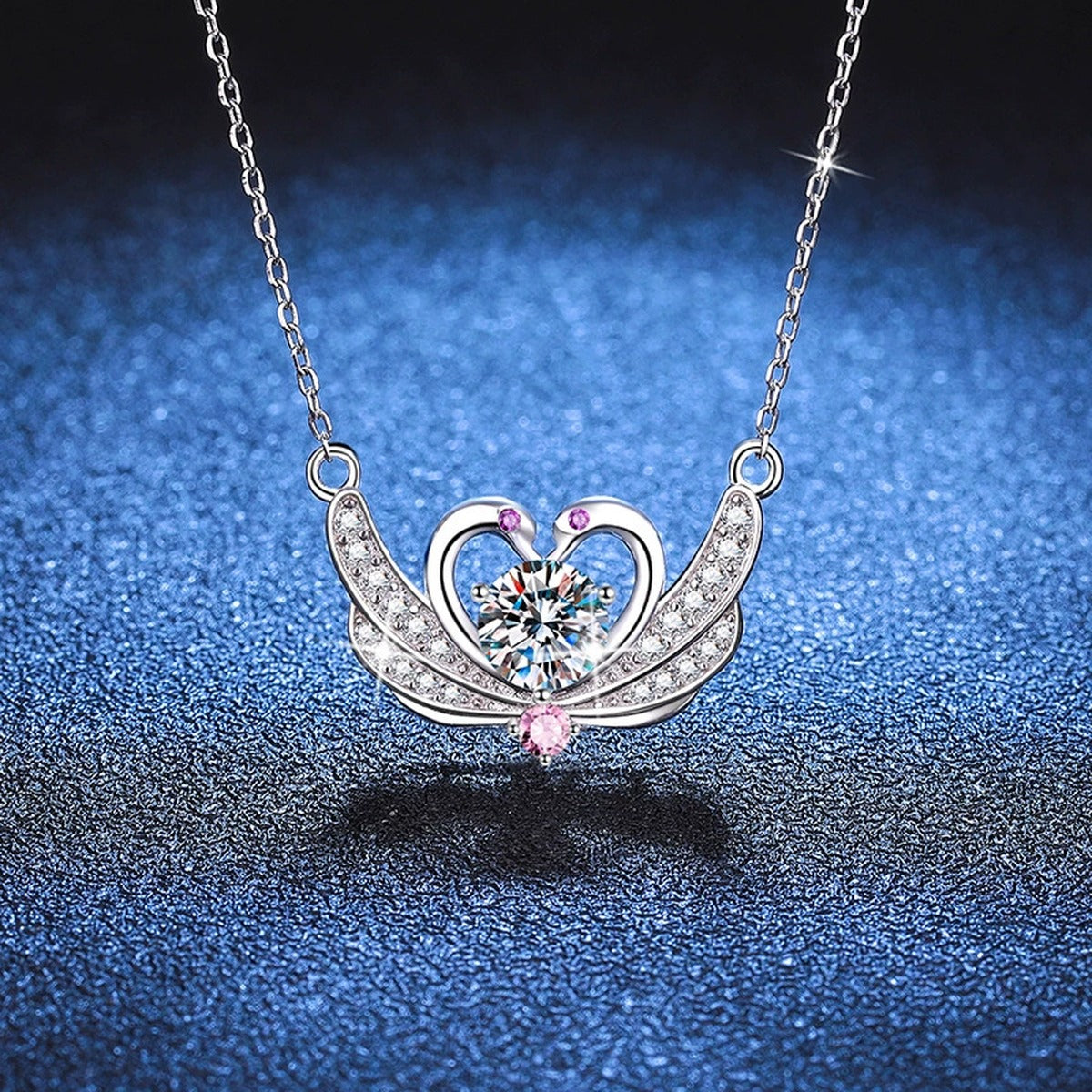 Butterfly Heart Moissanite Pendant Necklace in Platinum-Plated S925 Sterling Silver blue background close-up view