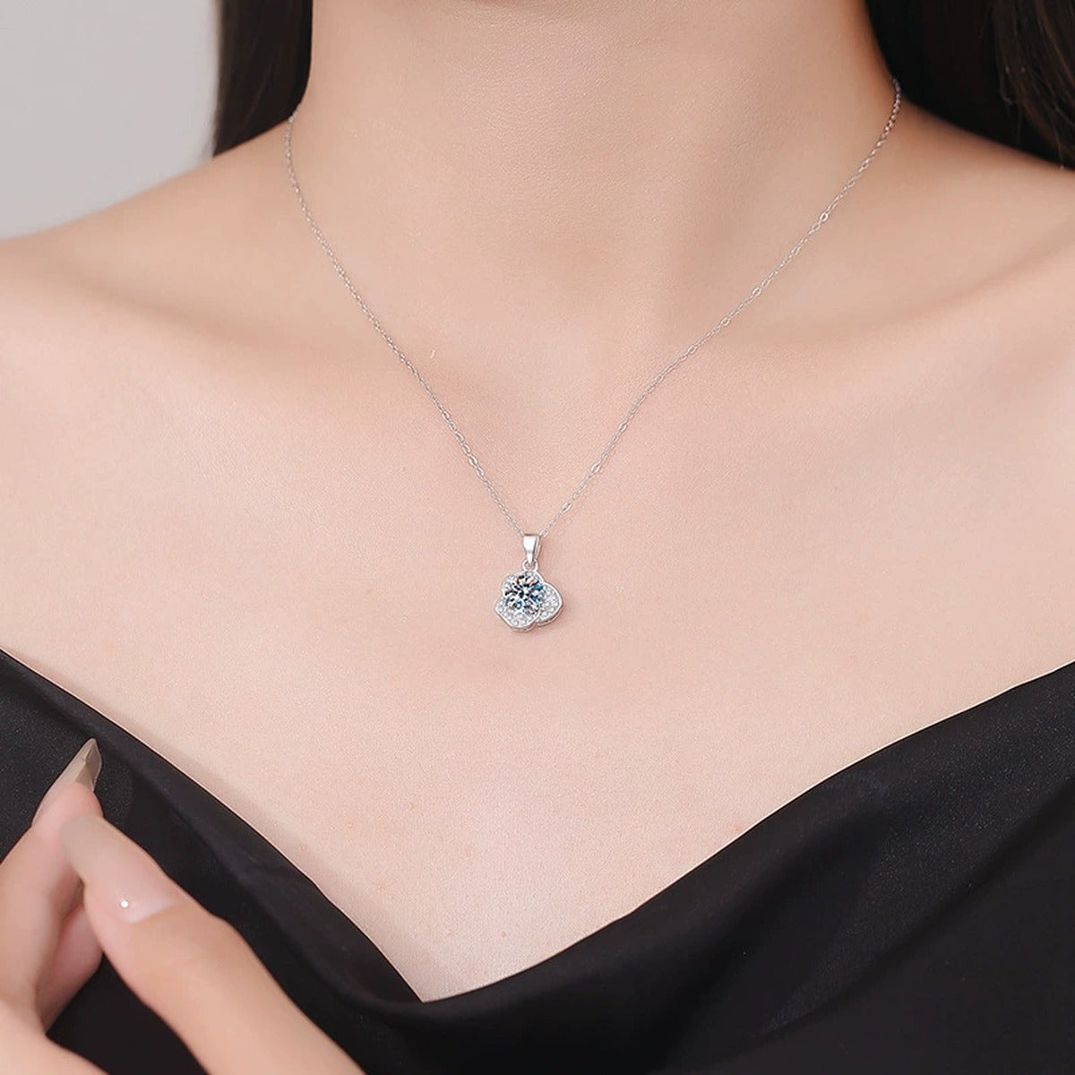 Round Clover Halo Moissanite Pendant Necklace in Platinum-Plated S925 Sterling Silver worn on neckline by model
