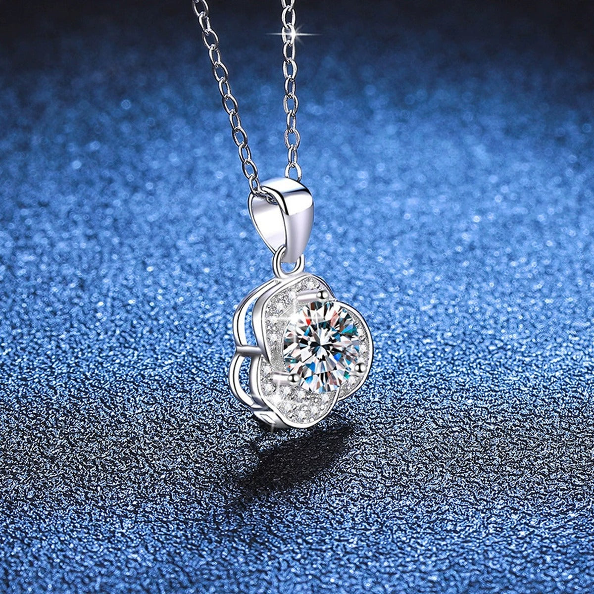 Round Clover Halo Moissanite Pendant Necklace in Platinum-Plated S925 Sterling Silver blue background product view