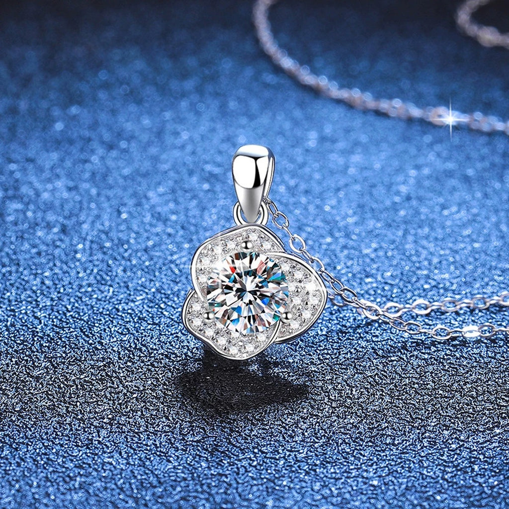 Round Clover Halo Moissanite Pendant Necklace in Platinum-Plated S925 Sterling Silver blue background angled view