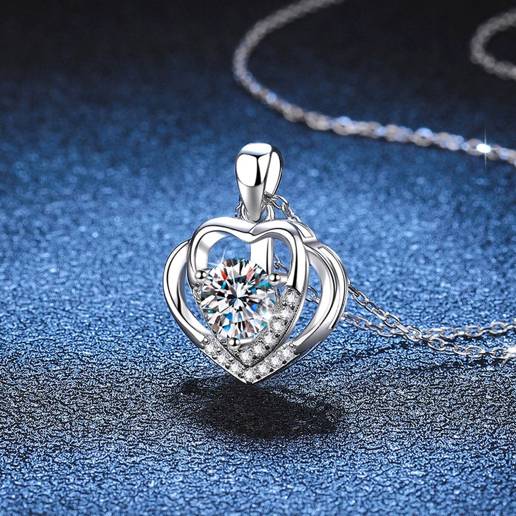 Heart Frame Moissanite Pendant Necklace in Platinum-Plated S925 Sterling Silver blue background product view