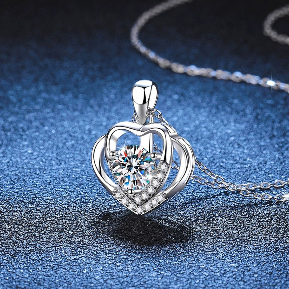Heart Frame Moissanite Pendant Necklace in Platinum-Plated S925 Sterling Silver blue background product view