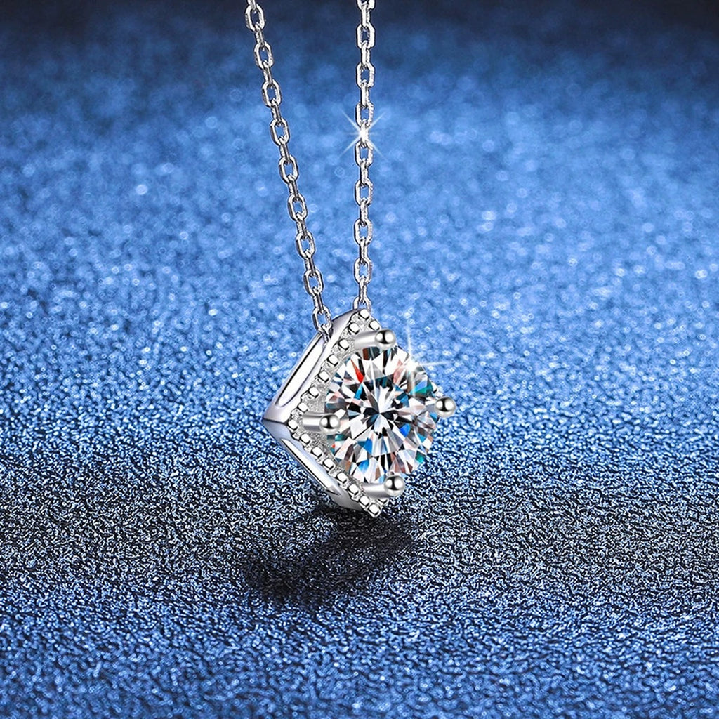 Cushion Halo Moissanite Pendant Necklace in Platinum-Plated S925 Sterling Silver blue background angled view