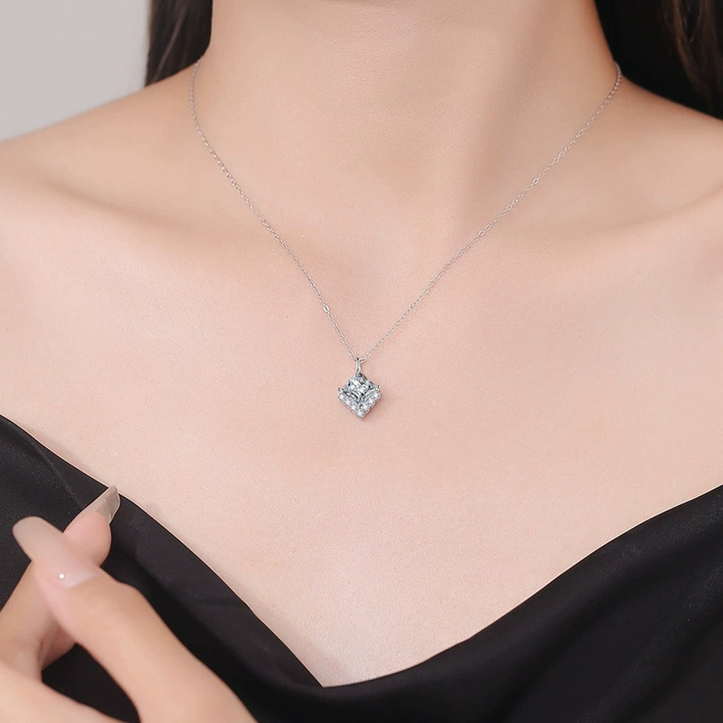 Princess-Cut Moissanite Pendant Necklace in Platinum-Plated S925 Sterling Silver worn on neckline by model