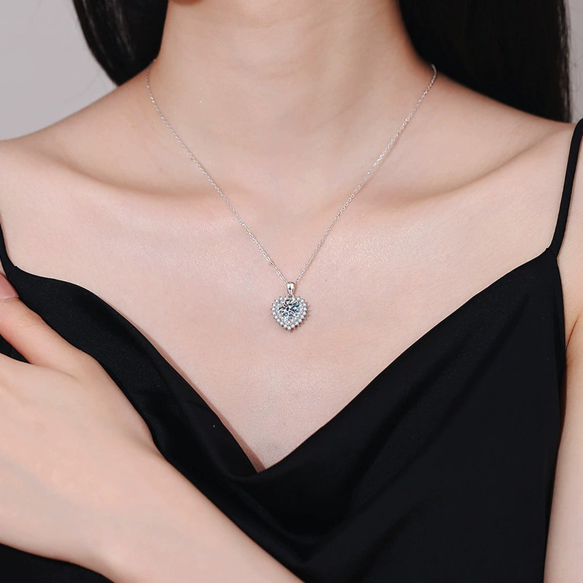 Round Halo Moissanite Pendant Necklace in Platinum-Plated S925 Sterling Silver worn on neckline by model