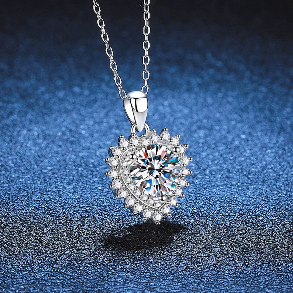 Round Halo Moissanite Pendant Necklace in Platinum-Plated S925 Sterling Silver blue background angled view