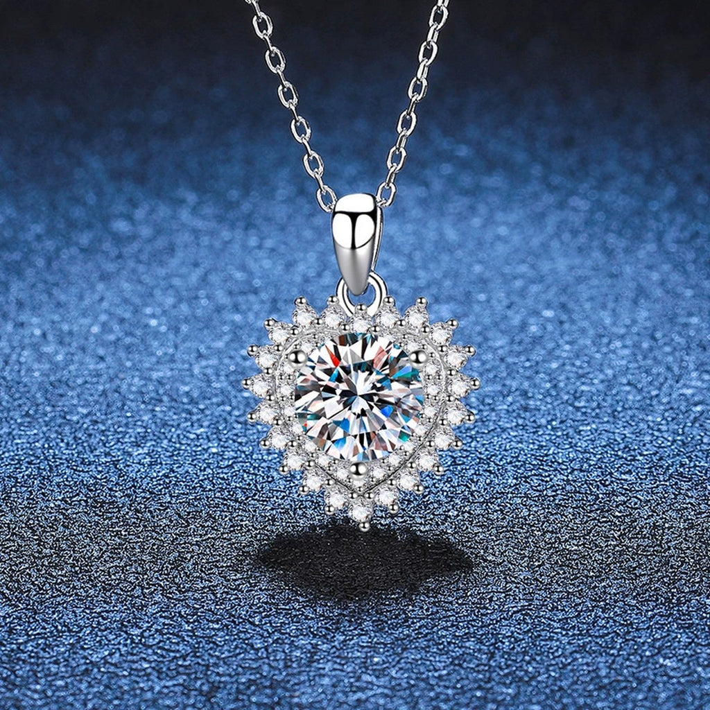 Round Halo Moissanite Pendant Necklace in Platinum-Plated S925 Sterling Silver blue background close-up view