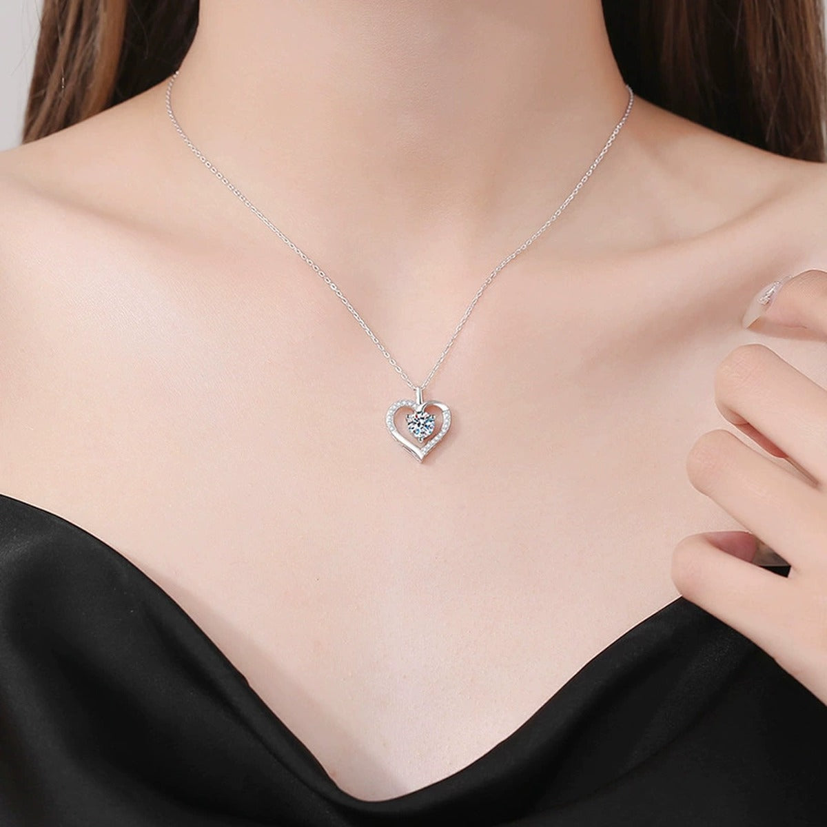 Open Heart Moissanite Pendant Necklace in Platinum-Plated S925 Sterling Silver worn on neckline by model