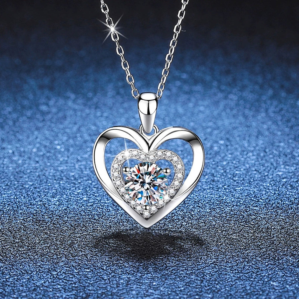 Heart Halo Moissanite Pendant Necklace in Platinum-Plated S925 Sterling Silver blue background angled view