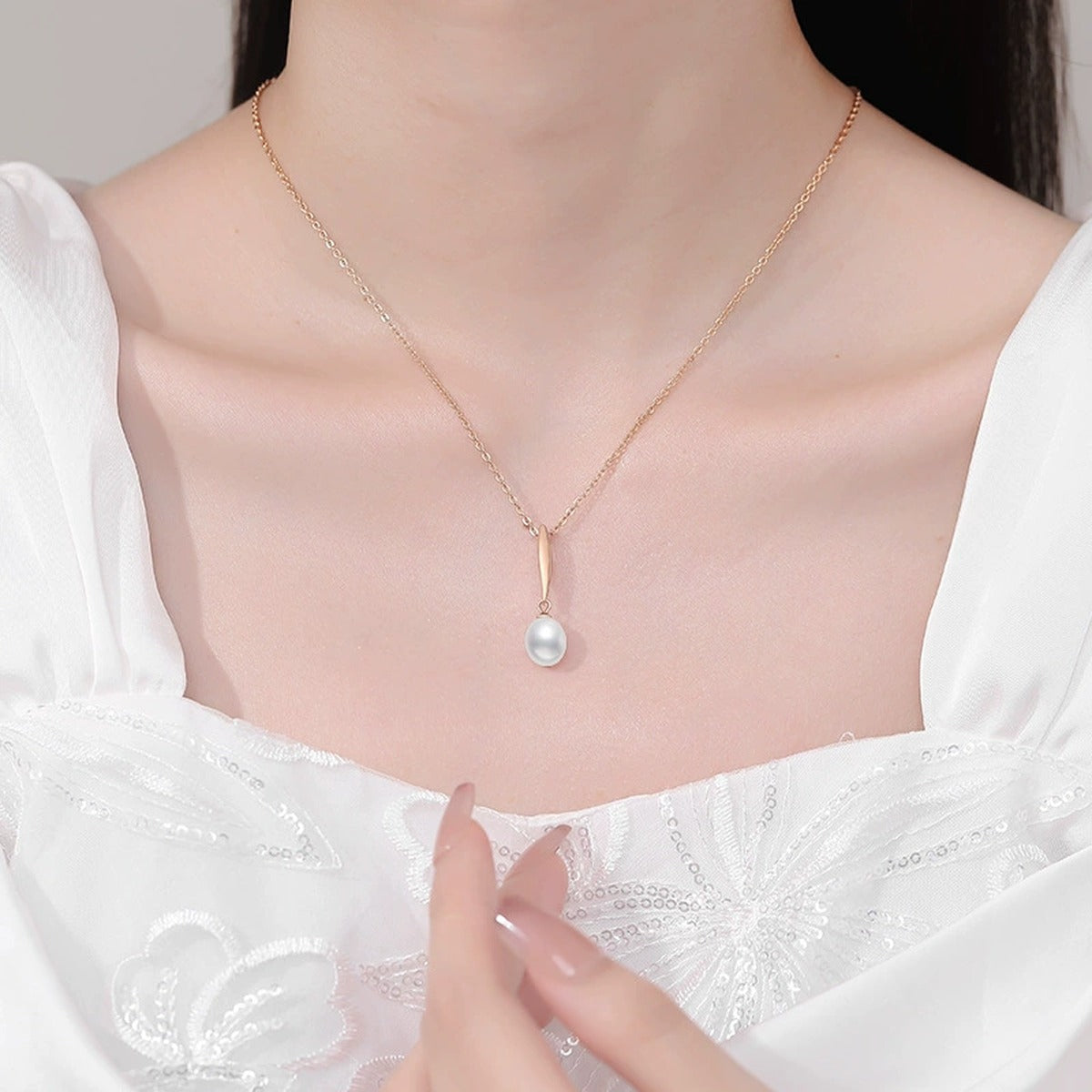 Freshwater Pearl Pendant Necklace in Gold-Plated S925 Sterling Silver worn on neckline by model