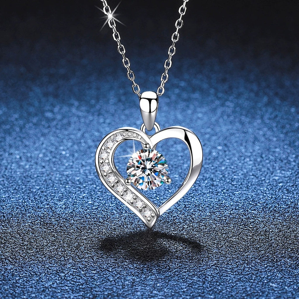 Heart Halo Moissanite Pendant Necklace in Platinum-Plated S925 Sterling Silver blue background angled view