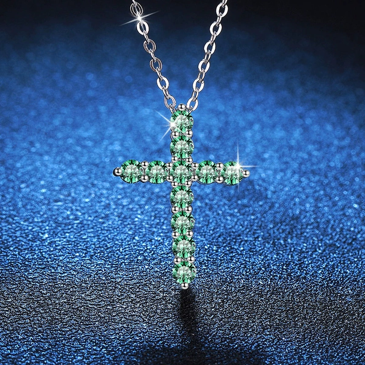 Blue Moissanite Cross Pendant Necklace in Platinum-Plated S925 Sterling Silver blue background product view