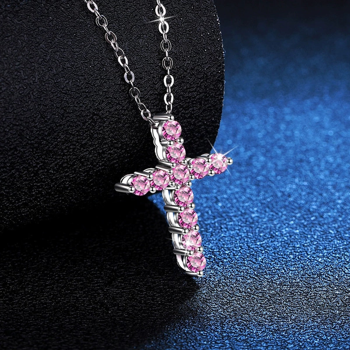 Blue Moissanite Cross Pendant Necklace in Platinum-Plated S925 Sterling Silver blue background angled view
