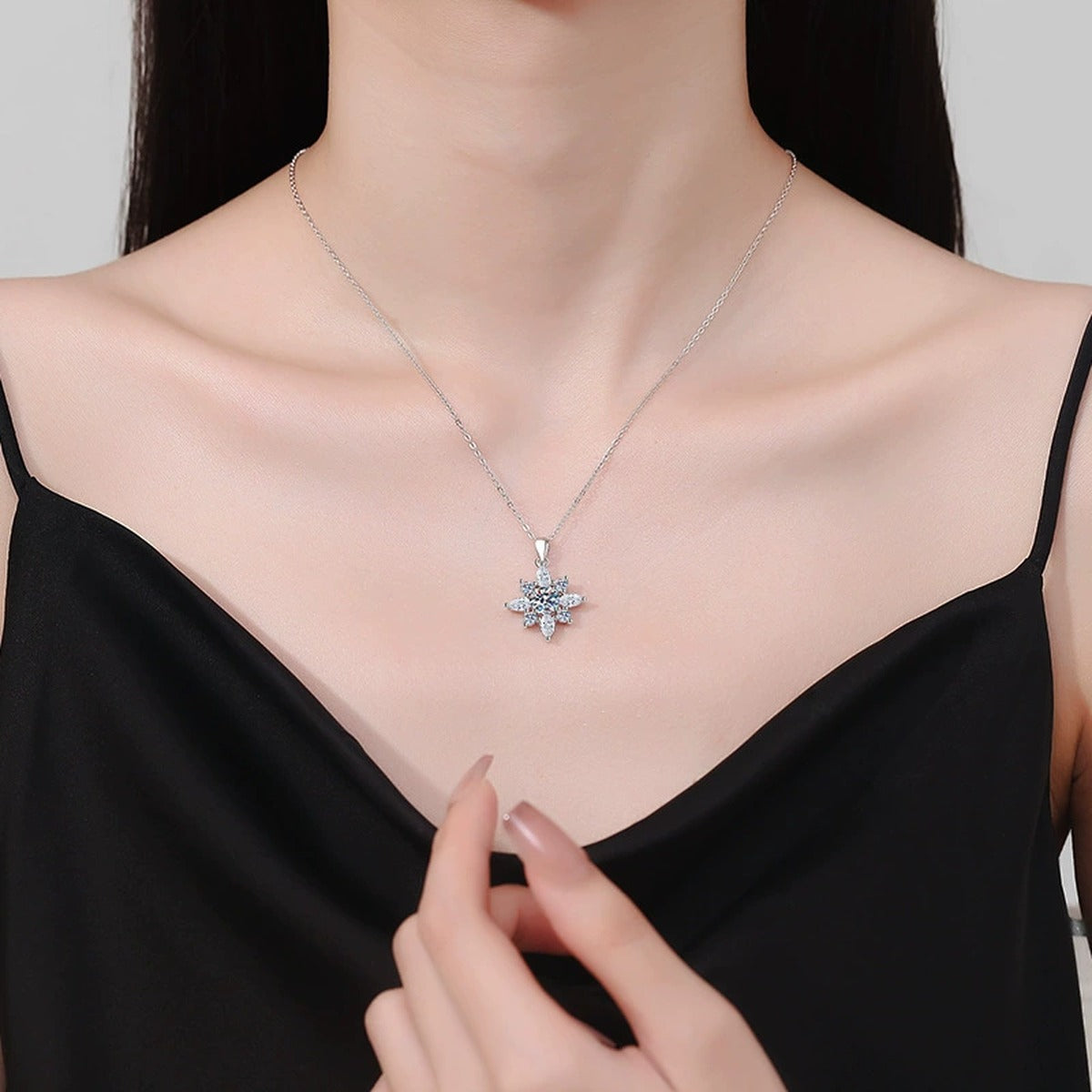 Starburst Moissanite Pendant Necklace in Platinum-Plated S925 Sterling Silver worn on neckline by model