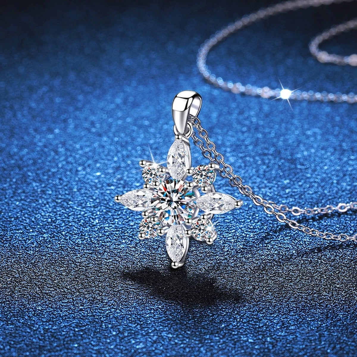Starburst Moissanite Pendant Necklace in Platinum-Plated S925 Sterling Silver blue background angled view