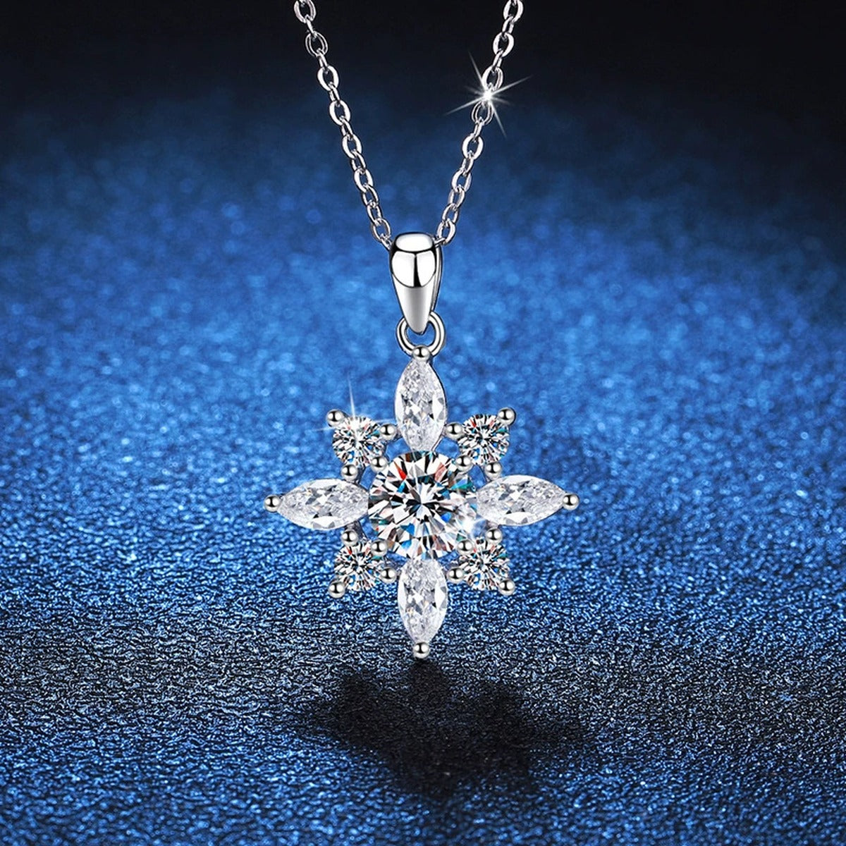 Starburst Moissanite Pendant Necklace in Platinum-Plated S925 Sterling Silver blue background close-up view