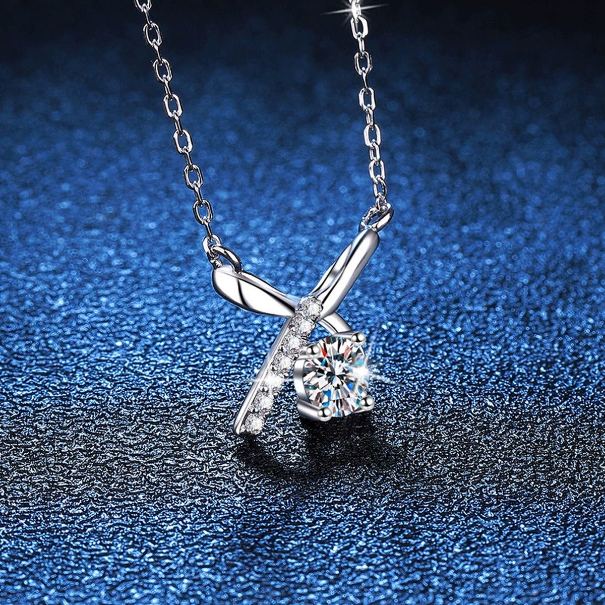 Bow Moissanite Pendant Necklace in Platinum-Plated S925 Sterling Silver blue background product view
