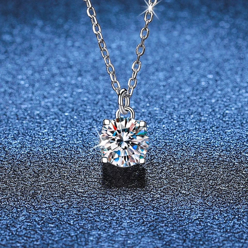 Round Solitaire Moissanite Pendant Necklace in Platinum-Plated S925 Sterling Silver blue background product view