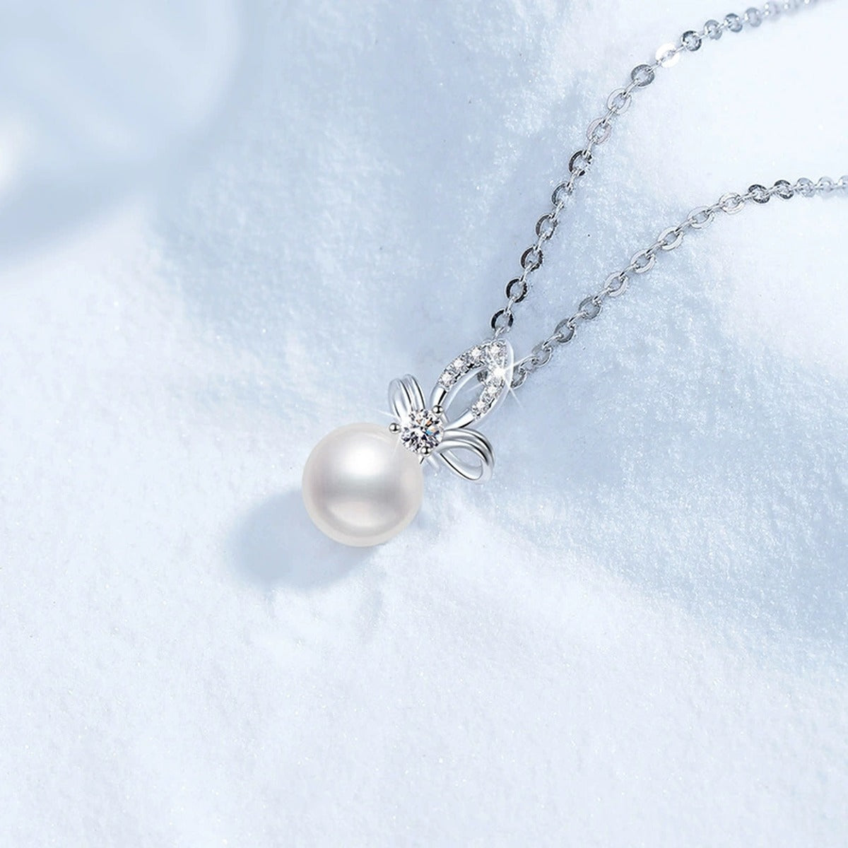 Moissanite Freshwater Pearl Pendant Necklace with Cubic Zirconia in White Gold-Plated S925 Sterling Silver blue background product view