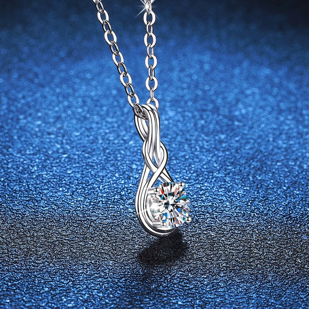 Teardrop Twist Moissanite Pendant Necklace in Platinum-Plated S925 Sterling Silver blue background product view