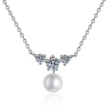 Moissanite Pearl Pendant Necklace in White Gold-Plated S925 Sterling Silver on clean white background showing the pearl pendant balanced with a round moissanite accent