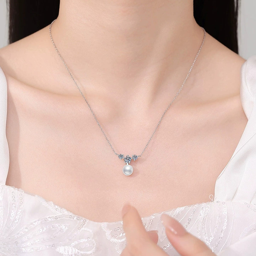 Moissanite Pearl Pendant Necklace in White Gold-Plated S925 Sterling Silver worn on neckline by model