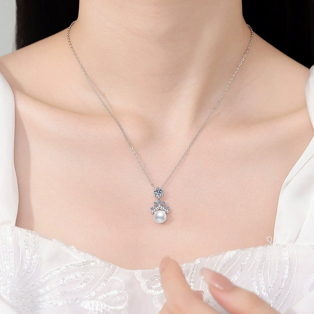 Moissanite Pearl Pendant Necklace with Cubic Zirconia in White Gold-Plated S925 Sterling Silver worn on neckline by model