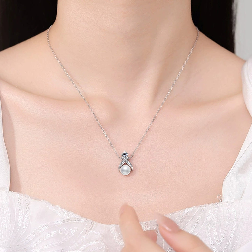 Moissanite Pearl Pendant Necklace with Cubic Zirconia in White Gold-Plated S925 Sterling Silver worn on neckline by model