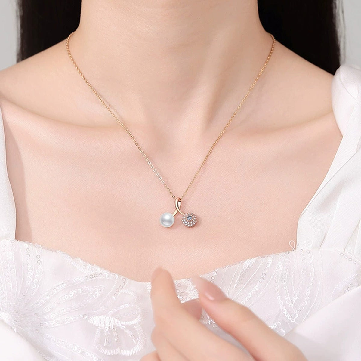 Moissanite Pearl Pendant Necklace with Cubic Zirconia in Gold-Plated S925 Sterling Silver worn on neckline by model