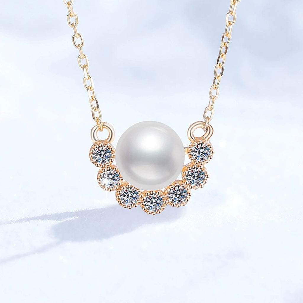 Curved Moissanite Freshwater Pearl Pendant Necklace in White Gold-Plated S925 Sterling Silver on clean white background showing the curved pendant with a freshwater pearl and lower arc of moissanite detail