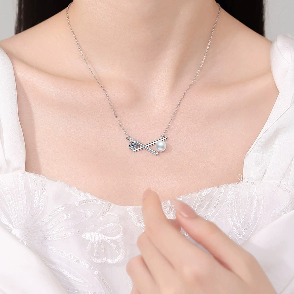 Bar Moissanite Freshwater Pearl Pendant Necklace with Cubic Zirconia in White Gold-Plated S925 Sterling Silver worn on neckline by model