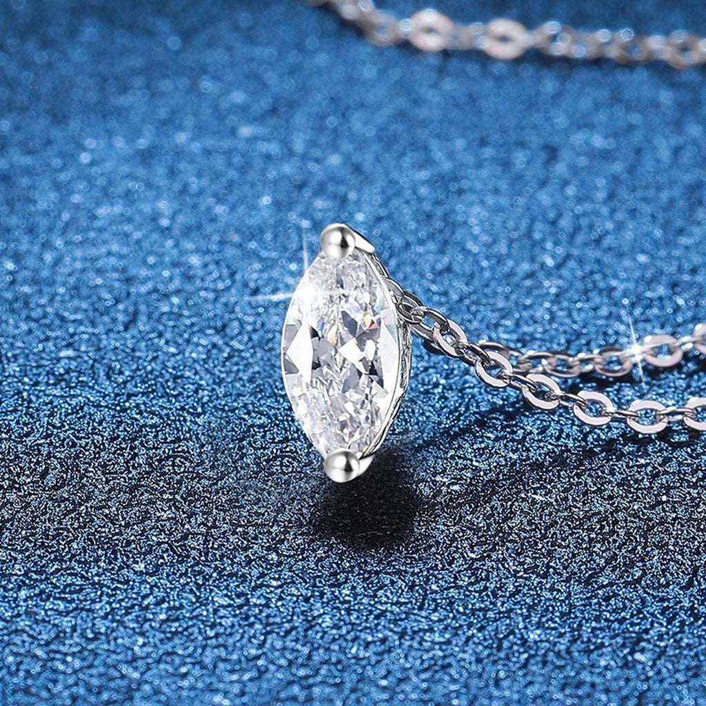 Marquise Moissanite Pendant Necklace in Platinum-Plated S925 Sterling Silver blue background close-up view