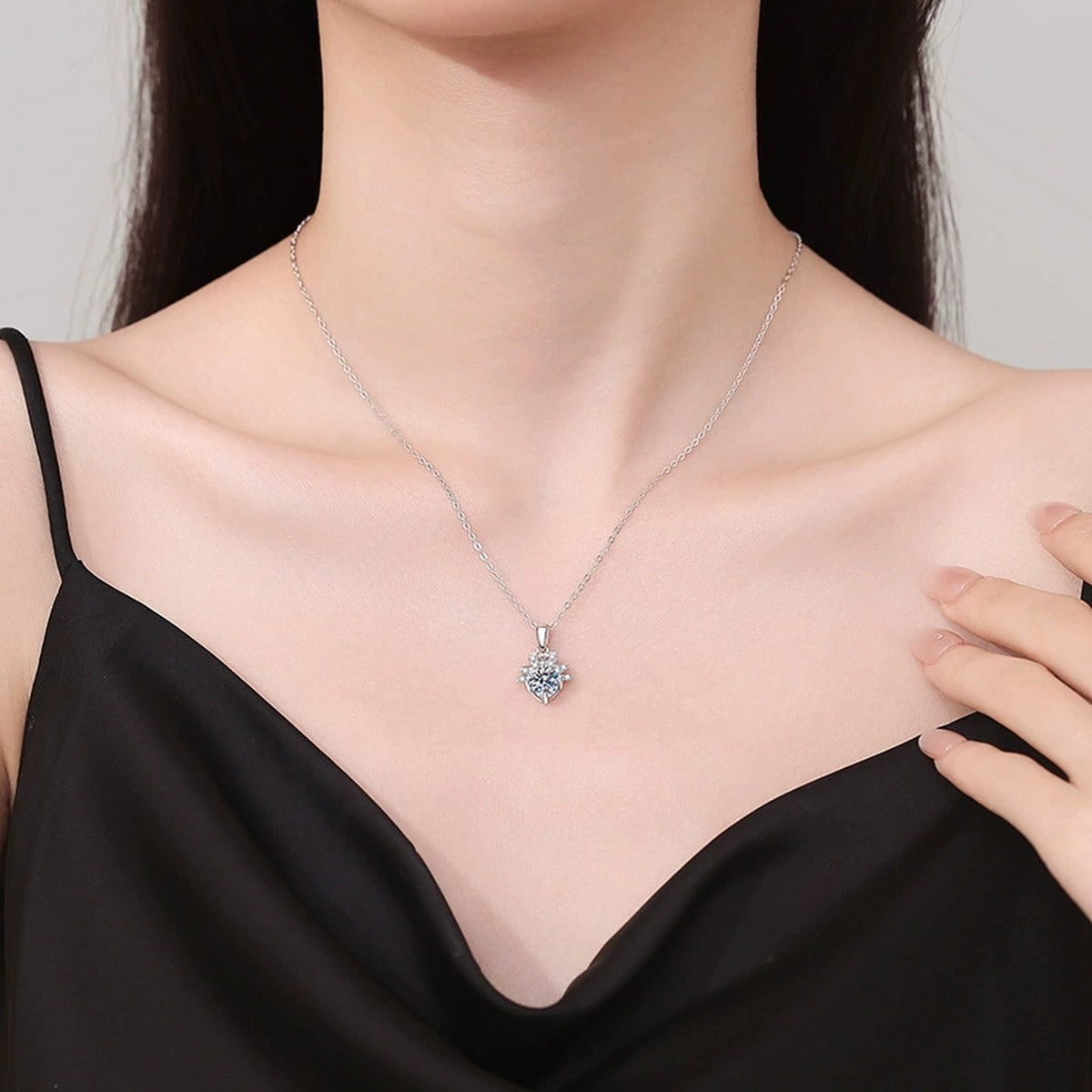 Floral Halo Moissanite Pendant Necklace in Platinum-Plated S925 Sterling Silver worn on neckline by model