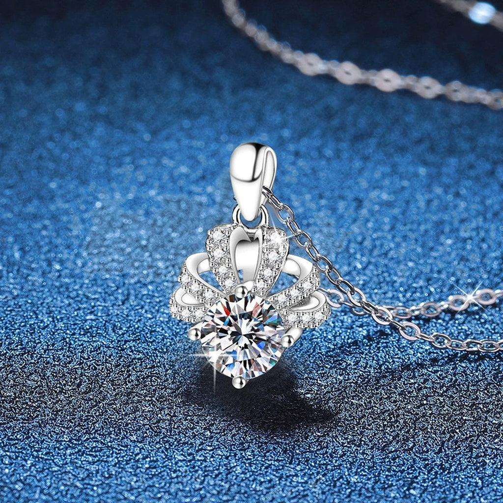Floral Halo Moissanite Pendant Necklace in Platinum-Plated S925 Sterling Silver blue background close-up view