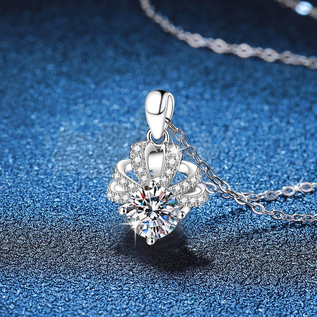 Floral Halo Moissanite Pendant Necklace in Platinum-Plated S925 Sterling Silver blue background close-up view