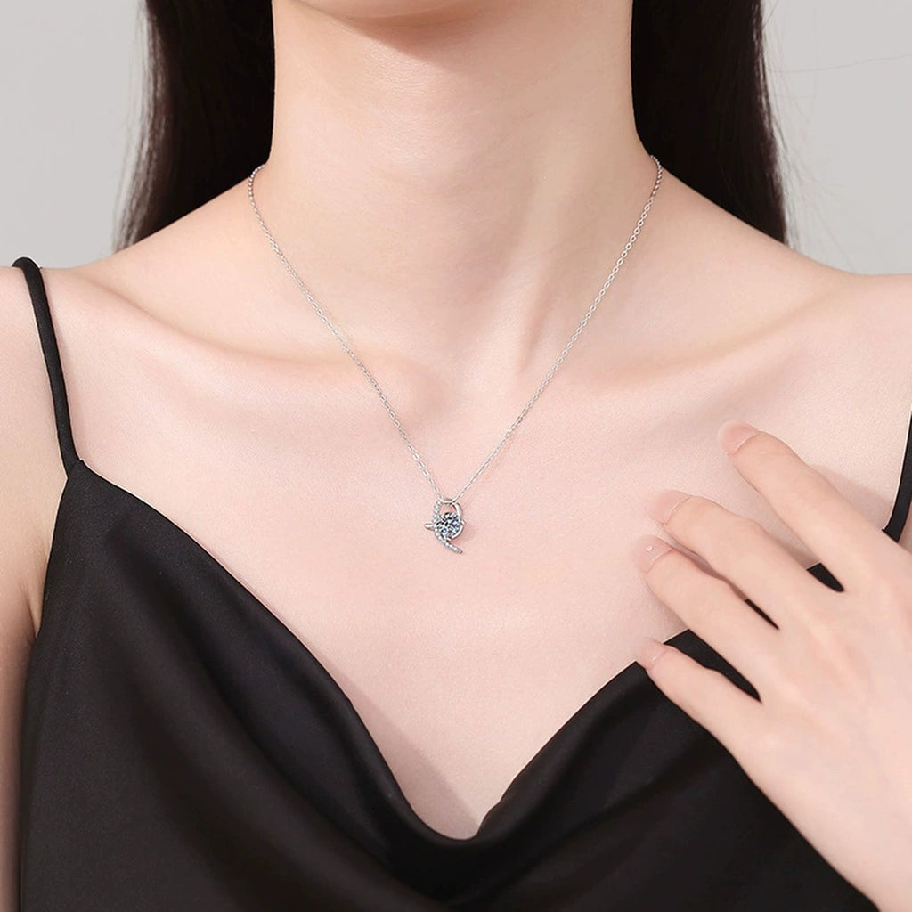 Crescent Moon Moissanite Pendant Necklace in Platinum-Plated S925 Sterling Silver worn on neckline by model