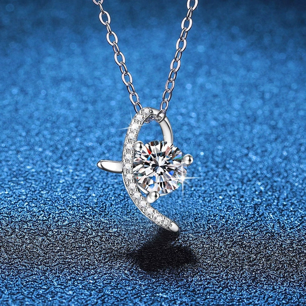 Crescent Moon Moissanite Pendant Necklace in Platinum-Plated S925 Sterling Silver blue background product view