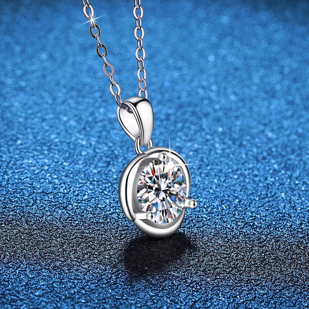 Round Bezel Moissanite Pendant Necklace in Platinum-Plated S925 Sterling Silver blue background product view