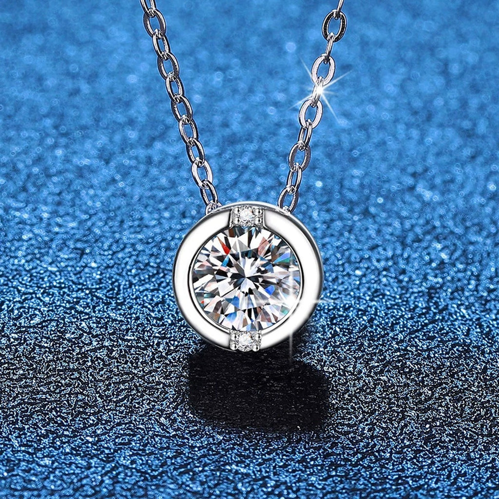 Round Solitaire Moissanite Pendant Necklace in Platinum-Plated S925 Sterling Silver blue background product view