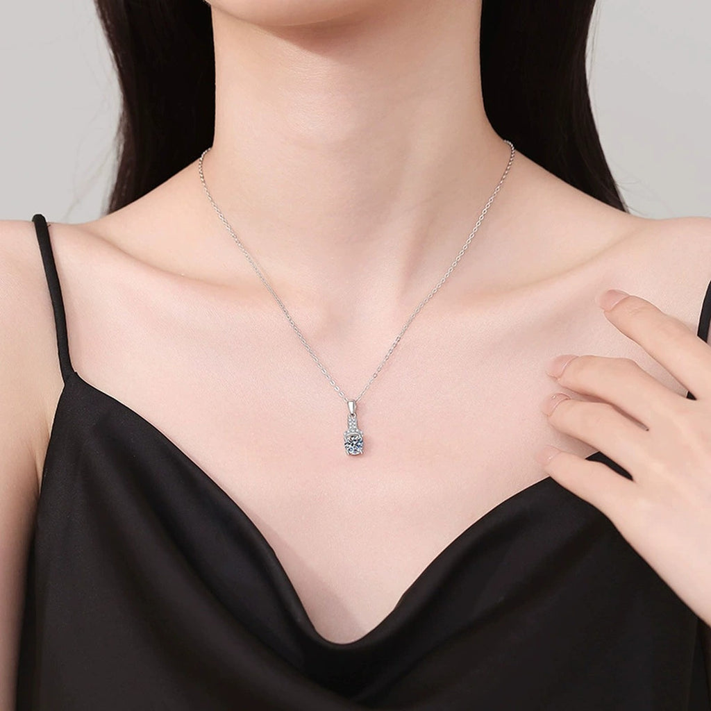 Pave Bar Moissanite Pendant Necklace in Platinum-Plated S925 Sterling Silver worn on neckline by model