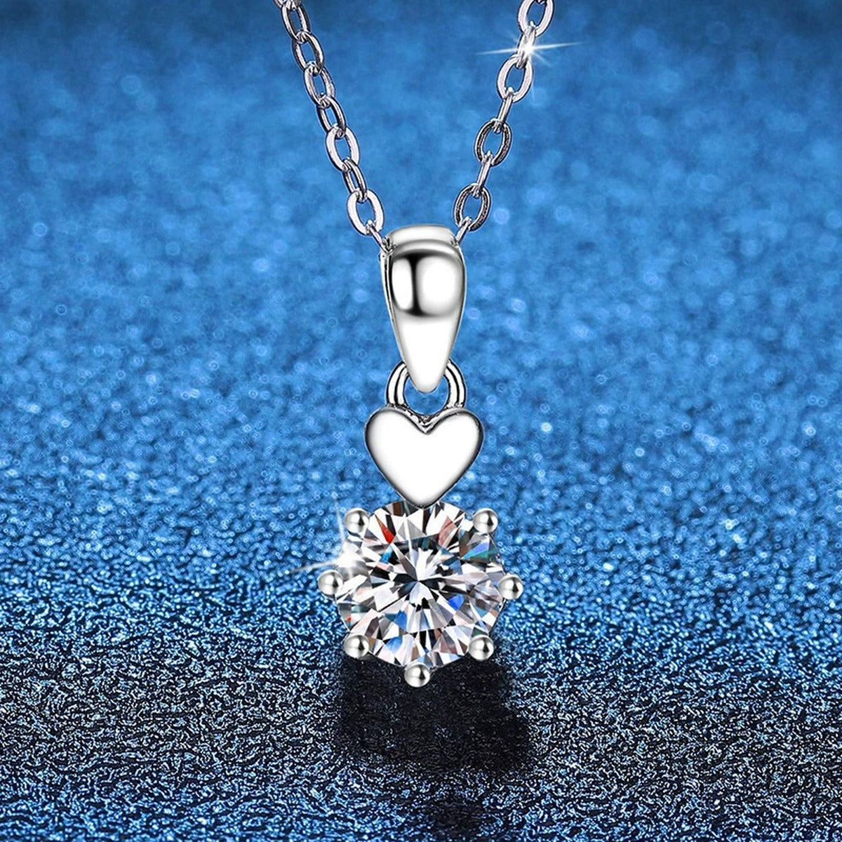 Heart Charm Moissanite Pendant Necklace in Platinum-Plated S925 Sterling Silver blue background product view