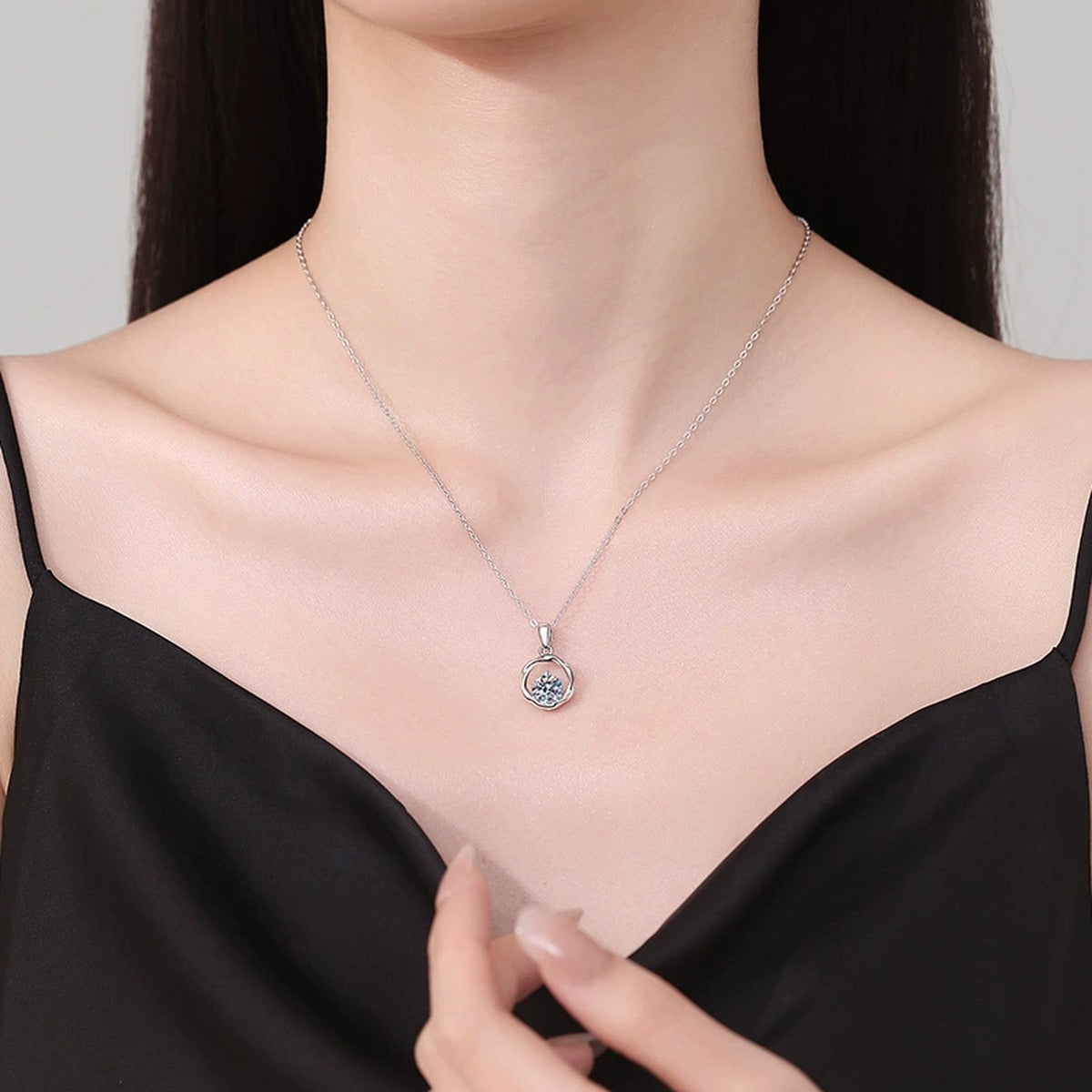 Organic Circle Moissanite Pendant Necklace in Platinum-Plated S925 Sterling Silver worn on neckline by model