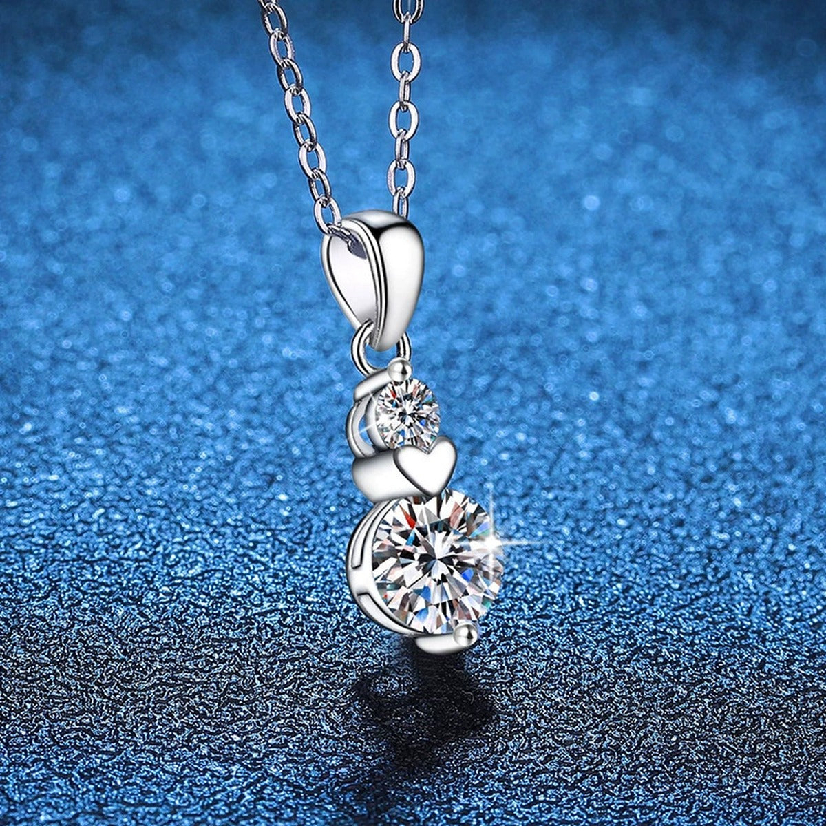 Two-Stone Drop Moissanite Pendant Necklace in Platinum-Plated S925 Sterling Silver blue background product view
