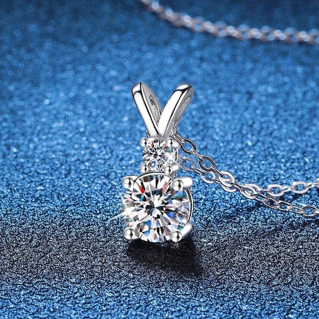 Graduated Drop Moissanite Pendant Necklace in Platinum-Plated S925 Sterling Silver blue background product view