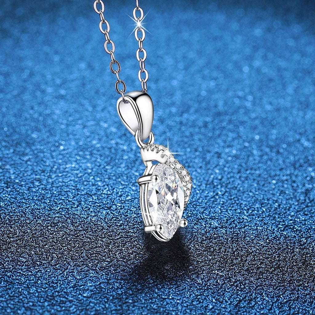 Marquise Teardrop Moissanite Pendant Necklace in Platinum-Plated S925 Sterling Silver blue background angled view