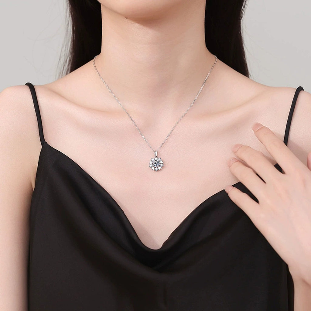 Floral Starburst Moissanite Pendant Necklace in Platinum-Plated S925 Sterling Silver worn on neckline by model